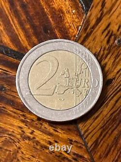 Translation: Very rare Greek 2002 2 Euro coin