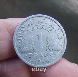 VERY RARE and GENUINE 1 franc Bazor 1944 small c, with the true small c