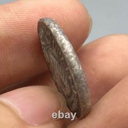 Very old rare ancient silver Buddha coin from the empire
