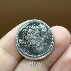 Very rare ancient Greek silver coin with two faces of a king.