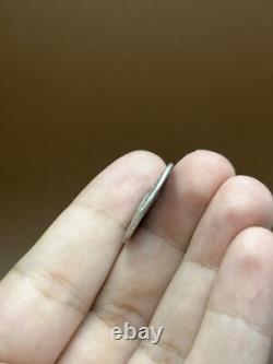 Very rare ancient Greek silver coin with two faces of a king.