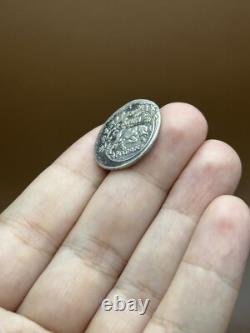 Very rare ancient Greek silver coin with two faces of a king.
