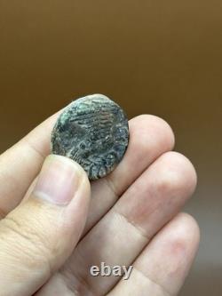 Very rare ancient image of a Greek bronze coin featuring a woman with wings