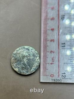 Very rare ancient image of a Greek bronze coin featuring a woman with wings