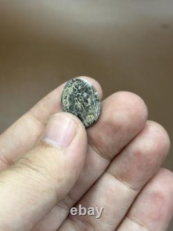 Very unique and rare ancient bronze coin featuring a king's image and