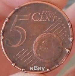 Pièce de monnaie 5 centimes euros fautée surplus de métal trés rare voire unique